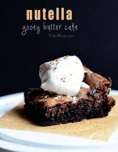 nutella gooey butter cake with whipped cream on top