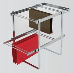 two file folders in a metal holder with red and black files on each side