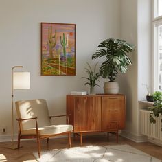 a living room with two chairs and a painting on the wall