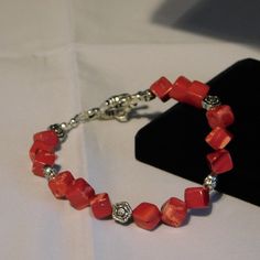 Brand New! Made For A Larger Sized Wrist. 8.5 Inches Long Toggle Clasp Designed & Handmade By Me, Diane. Adjustable Coral Jewelry With Polished Beads, Elegant Red Coral Beaded Bracelets With Adjustable Fit, Red Bracelets With Silver Beads For Jewelry Making, Adjustable Red Bracelets With Polished Beads, Adjustable Red Jewelry With Silver Beads, Elegant Adjustable Coral Beaded Bracelet, Adjustable Red Coral Beaded Bracelet, Adjustable Red Nickel-free Bracelet, Adjustable Red Nickel-free Bracelets