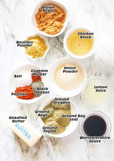 the ingredients to make this recipe are shown in bowls on a marble counter top, including spices and seasonings