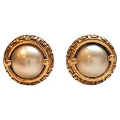 18K Yellow Gold Mobe Pearl Earrings  Omega back earrings with mobe pearl and aztec design in 18K yellow gold. Hallmark: 750 GOI38 750AI Italy Weight: 13.3 g/ 8.6 dwt. Size: 18.3 mm X 18.3 mm X 7.4 mm # of stones: 2 white Very good condition, professionally polished. Will come packaged in a gift box or pouch (when possible) and will be shipped U.S. Priority Mail Insured. AD051624/17KCS Aztec Design, Aztec Designs, Button Earrings, Jewelry Vintage, Priority Mail, Gold Jewelry, Vintage Jewelry, Pearl Earrings, Gift Box