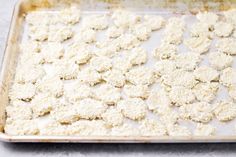 a baking pan filled with food on top of a counter