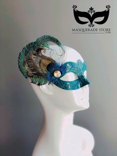 This teal masquerade mask is part of our luxury PEACOCK feathered mask collection. The peacock feathers sit on the side of the mask embellished with a beautiful gold gem. Kindly leave a checkout note if you wish to have the feathers on the opposite side of the mask. S H I P P I N G - Processed same day or within 24 hours. 1-2 day guaranteed delivery services are offered, add items to the cart, and click on the shipping tab for rates. Pls leave a check-out note with your need date & contact numbe Peacock Mask Masquerade, Peacock Masquerade Mask, Masquerade Formal, Feathered Mask, Peacock Mask, Masquerade Mask Women, Elegant Face Mask, Cowgirl Bachelorette Parties, Mask Collection