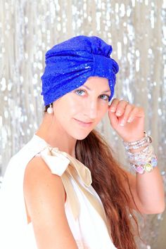 "One part exotic, one part glam...this fashion turban is all parts show-stopping style!! Keep your locks in fabulous condition...and under wraps, in this royal blue sequin turban!! Sparkle in the sunshine, sparkle in the disco light...this piece has it's own magic and looks as great with a white tank as it does with a boho maxi dress!! Tuck your hair up into it for a 1920's take on the item, or let your hair fall loose for a more bohemian vibe. ♥Extra stretchy; one size will fit most...So comfor Bohemian Headpieces With Matching Headband For Party, Bohemian Party Headpieces With Matching Headband, Bohemian Headwrap Headband For Party, Bohemian Party Headband Headwrap, Summer Party Turban, Blue Turban Headband For Summer, Blue Headband Turban For Summer, Bohemian Blue Headpiece For Party, Blue Bohemian Headpieces For Party