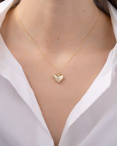 Zoe Lev Jewelry necklace    Approx. 16"  18"L    Heart pendant and chain in polished 14karat yellow gold    White diamond solitaire    0.02 total carat weight    Spring ring clasp    Made in USA Yellow Gold Heart Cut Locket Necklace For Anniversary, 14k Gold Heart Pendant Locket For Anniversary, Delicate 14k Yellow Gold Heart Necklace, Elegant Yellow Gold Heart Necklace Keepsake, Everyday Yellow Gold Heart Cut Charm Necklace, Elegant Yellow Gold Heart Necklace For Keepsake, Yellow Gold Heart Pendant Locket Necklace For Wedding, 14k Gold Heart Cut Locket Jewelry, Classic Heart Shaped 14k Gold Locket Necklace