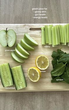 a cutting board topped with sliced up vegetables