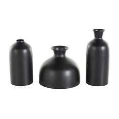 three black vases sitting next to each other