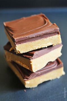 chocolate and peanut butter bars stacked on top of each other