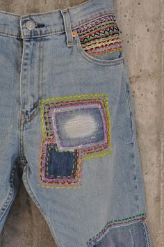 "Ready to send : Size 34 ,33,32,31 Unique vintage jeans with apcycled patches. One of a kind.. Hand made embroidery and unique painting .... ---Or---- Made to order, in any size, within 7 working days . If you need different size, please send me a message and I will make you a special and unique design within 2 working days. They are all different! No one will have the same one as you have! Hand painted, one of kind jeans. You pick your size, model (slime- boyfriend- high waist- low waist) and p Multicolor Straight Leg Patchwork Pants, Multicolor Straight Leg Pants With Patchwork, Multicolor Patchwork Straight Leg Pants, Multicolor Denim Patchwork Pants, Multicolor Patchwork Denim Pants, Multicolor Patchwork Straight Leg Bottoms, Multicolor Straight Leg Bottoms With Patchwork, Multicolor Denim Pants With Pockets, Multicolor Straight Leg Denim Pants