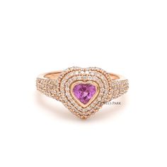 Pink sapphire heart and diamond ring gold | Natural 4MM pink sapphire ring gold | Bezel set heart ring | Pinky heart pink sapphire ring gold STONE DETAILS : ✦ Gemstone : Pink Sapphire ✦ Gemstone Type : Natural ✦ Gemstone Size : 4 MM ✦ Gemstone Shape : Heart cut ✦ Number of gemstones : 1 ✦ Gemstone Weight : 0.50 Carats ✦ Gemstone Grade : AAA DIAMOND DETAILS : ✦ Diamond Type : Natural ✦ Diamond Size : 1.00 mm ✦ Diamond Color : F-G ✦ Diamond Clarity : Slightly included ✦ Diamond Cut : Excellent - V Pink Heart Cut Ruby Ring For Valentine's Day, Elegant Double Heart Pink Rings, Pink Diamond Heart Ring With Gemstone, Pink Diamond Heart Ring With Halo Setting, Pink Heart-shaped Brilliant Cut Ring, Pink Heart Shaped Ring With Brilliant Cut, Fine Jewelry Pink Heart Ring With Brilliant Cut, Pink Brilliant Cut Heart Ring For Valentine's Day, Heart-shaped Sapphire Ring, Fine Jewelry