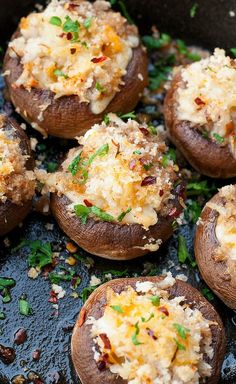 baked potatoes with cheese and herbs cooking in a skillet