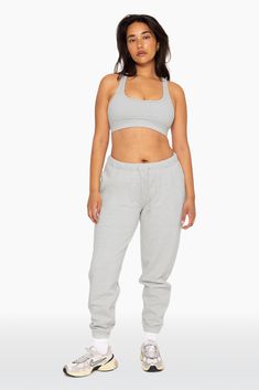 Stay cozy in our Drawstring Sweatpants in Heather Grey. Boasting a high rise, encased elastic waist and ankle bands, and an embroidered SET logo on the upper right thigh, these sweatpants combine comfort with sophistication. Crafted from our heavyweight sweats fabric, they ensure maximum coziness. Gray Relaxed Fit Cozy Activewear, Cozy Gray Activewear With Relaxed Fit, Cozy Gray Relaxed Fit Activewear, Gray Activewear With Ribbed Cuffs For Loungewear, Gray Activewear For Loungewear, Sportswear Sweats With Elastic Waistband For Lounging, Winter Athleisure Sweatpants For Lounging, Athleisure Sweatpants For Lounging In Winter, Sportswear Joggers With Elastic Waistband For Loungewear