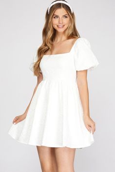 **CLEARANCE - ALL SALES FINAL Our puff sleeve jacquard bridal babydoll dress is the perfect choice for all events for the bride to be. From bridal showers to bachelorette parties, this dress with have your back. It features a textured jacquard fabric, with a babydoll-inspired silhouette, a square neck and back, pleating for shape and a zip back closure. Add some strappy heels for a more dressed up look or pair with some cute white wedge sandals for a more casual event. Item Description: Bridal C Confirmation Dresses, White Babydoll Dress, Fancy Short Dresses, Cute Formal Dresses, White Wedge Sandals, Bridal Events, Babydoll Mini Dress, Short Puff Sleeve, Bachelorette Parties