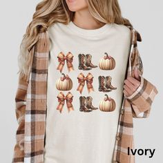 🍂 Embrace autumn vibes with our Cute Fall Pumpkins Boots and Bows T-Shirt! Perfect for a cozy country style, this Western Autumn Graphic Tee combines rustic charm with comfort. Ideal for crisp fall days, this top is sure to become a seasonal favorite. Make a statement and stay cozy! 🍁👢  Comfort Colors 1717 is a fully customizable tee made 100% with ring-spun cotton. The soft-washed, garment-dyed fabric brings extra coziness to your wardrobe while the relaxed fit makes it an excellent daily ch Casual Brown T-shirt For Fall, Trendy Comfortable Fit T-shirt For Fall, Trendy Comfort Fit T-shirt For Fall, Brown Graphic Tee For Fall, Trendy Brown T-shirt For Fall, Fall Graphic Tee In Brown, Brown Letter Print T-shirt For Fall, Comfortable Fit Graphic Tee For Fall, Cute Fall T-shirt With Relaxed Fit