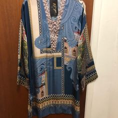 Size Large Silk Printed Long Sleeve Tunic, Silk Printed Tunic With Long Sleeves, Printed Silk Tunic With Long Sleeves, Long Sleeve Silk Tunic With Print, Long Sleeve Floral Tunic For Eid, Multicolor Silk Tunic With Long Sleeves, Multicolor Long Sleeve Silk Tunic, Elegant Long Sleeve Printed Tunic, Casual Long Sleeve Dresses For Eid