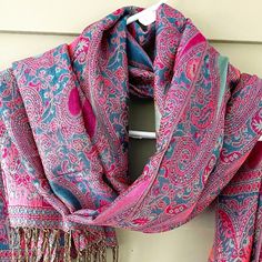 A Gorgeous, Light-Weight Yet Warm Pashmina Scarf In Pink And Teal Blue Adorned With Paisley Print All Over The Scarf. Perfect For Any Occasion And A Great Gift For Anyone. Brand New Item Material: Woven Pashmina (55% Pashmina.45%Silk) Style: Shawl, Scarf, Fringed Color: Pink And Blue Pattern: Paisley All Over Size: 76" Long 27" Wide Fringes: 3" On Both Ends Pink Bohemian Pashmina Shawl, Pink Winter Pashmina Shawl, Pink Pashmina Shawl For Winter, Graphic Scarf, Scarves Winter, Festival Scarves, Striped Shawl, Paisley Shawl, Cable Knit Scarf