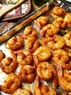 cooked shrimp on a baking sheet ready to be served