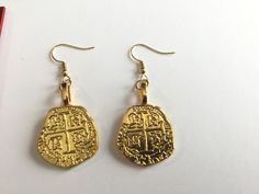 These gold colored replica pirate coins earrings are fun! They would be perfect for Halloween with a pirate costume, & for St. Patrick's Day! Handmade in Minnesota in 2019. Pirate Earrings, Pirate Coins, Coin Earrings, Pirate Costume, Saint Patrick, St Patricks, St Patrick, St Patricks Day, Favorite Jewelry