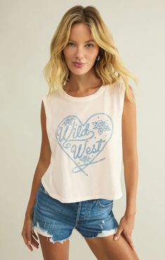 Show your love for the "wild west' in this relaxed muscle tank, with its fun western-inspired screen print on the front. This classic cotton crew neck is perfect for warm days but also looks great with your fave jacket. Regular fit Loose Knit Jersey: 100% Cotton Crew neck Sleeveless Lightweight Soft cotton jersey Machine Wash Cold, Tumble Dry Low, Wash Before Wear Linen Bottoms, Linen Romper, Love Now, White Floral Dress, Strapless Tops, Loungewear Sets, Top Graphic Tees, Party Tops, Muscle Tank