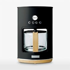 a black coffee maker with a wooden handle