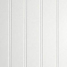 a white wall with vertical lines painted on it