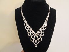 "This beauty is vintage and new old stock, never worn. Fabulous and GLAM....yet very realistic looking! Prong set rhinestones with lots of sparkle. It measures 15 1/2\" long plus a 3\" long extender. The fancy drop is about 1 3/4\" long. Well made and is ready for your evening out or big event! Low pricing as always." Vintage Rhinestone Necklace, Glam Jewelry, Sparkly Necklace, Turquoise Drop Earrings, Lovely Ring, Sterling Silver Hoop Earrings, Pretty Rings, Rhinestone Jewelry, Sterling Silver Hoops