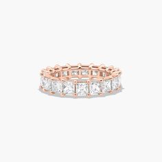 a rose gold ring with princess cut diamonds