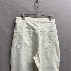 28 x 29 / 1990s Gitano Baggy Womens High Rise Tapered Leg Tan/White Pants Sz 12 W Flat Waist: 14in // Inseam: 29in // Rise: 12.5in Some signs of wear. Check photos. White Cotton 90s Style Pants, White 90s Style Cotton Pants, White Relaxed Fit Retro Bottoms, Vintage White Pants With Pockets, Retro High Rise White Bottoms, Retro White Pants With Pockets, White High Rise Retro Bottoms, White Retro Pants With Pockets, Retro White Bottoms With Pockets