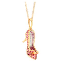 An elegant and very special high heel shoes pendant, set with ruby weighing 0.52 carats, mounted in 18 karat gold. O’Che 1867 was founded one and a half centuries ago in Macau. The brand is renowned for its high jewellery collections with fabulous designs. Our designs reflect the cultural and aesthetic value of its origin – Macau, where East meet West, with the inspiration from the beauty of oriental and Roman art. The finest hand selected precious stones inspire our designers’ creation, which a Shoe Pendant, High Jewellery, Roman Art, Paparazzi Jewelry, Exquisite Jewelry, High Jewelry, Macau, Pendant Set, Heel Shoes