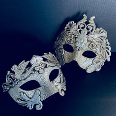 This couple's Masquerade Mask pairing complements any formal attire you choose for your masquerade Ball event. I N C L U D E D This listing is for a pair of Masks (one men's and one Women's Mask). Masks come with matching double sided satin ribbons attached. S H I P P I N G - Processed same day or within 24 hours. 1-2 day guaranteed delivery services offered, add items to cart and click on shipping tab for rates. Pls leave a check out note with your need date & contact number (especially for Carnival Costume Masks And Prosthetics, Fantasy Masks And Prosthetics For Mardi Gras Theater, Fantasy Carnival Masquerade Masks, Fantasy Style Costume Eye Mask, Fantasy Masquerade Mask For Carnival, Fantasy Theater Mask For Mardi Gras, Venetian Formal Eye Mask, Venetian Masquerade Mask For Costume Party, Silver Masquerade Mask For Mardi Gras Theater