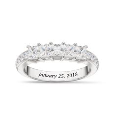 a white gold ring with five stones and the date january 25, 2018 on it