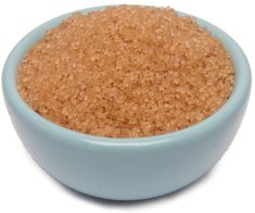 a blue bowl filled with brown sugar