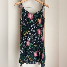 Never Worn - Floral Sundress With Gorgeous Detail Casual Black Floral Dress For Vacation, Black Floral Print Summer Dress, Black Sleeveless Floral Dress For Vacation, Casual Black Printed Sundress, Spring Black Printed Sundress, Black Printed Sundress For Spring, Black Fitted Floral Summer Dress, Fitted Black Floral Summer Dress, Casual Black Sleeveless Floral Dress