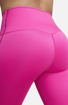 A wide, high waistband provides superior support in second-skin leggings featuring signature Dri-FIT technology and plenty of side pockets for essentials. Side drop-in pockets; zip pocket Dri-FIT moisture-wicking technology 68% nylon, 32% elastane Machine wash, tumble dry Imported High Stretch Pink Leggings For Running, Nike Moisture-wicking High-stretch Bottoms, Pink Athleisure Tights For Training, Nike High Stretch Moisture-wicking Bottoms, Pink Tight Functional Leggings, Moisture-wicking Pink Running Tights, Pink Moisture-wicking Running Tights, Pink Micro-elastic Sports Tights, High Stretch Pink Elastane Tights