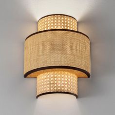 a wall light that is hanging on the wall