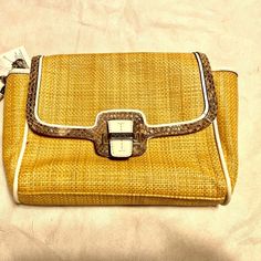 Coach Style # F50929 Straw With Leather Trim Inside Zip Pocket Snap Closure, Fabric Lining Wrist Strap Attached 9 1/2" (L) X 6" (H) X 1 7/8" (W) Coach Rectangular Travel Clutch, Trendy Coach Rectangular Clutch, Trendy Rectangular Coach Clutch, Trendy Coach Clutch For Travel, Coach Summer Shoulder Bag For Everyday, Coach Bags For Summer Travel, Coach Bags For Travel In Summer, Coach Travel Bags For Summer, Summer Coach Shoulder Bag For Everyday Use