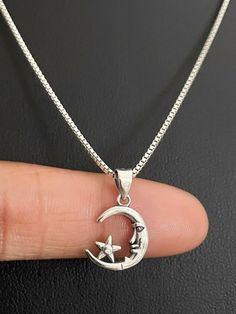 "Minimalist a d Dainty Sterling Silver Moon & Star Necklace, Celestial Necklace NECKLACE FEATURES: Metal: All components are made from solid .925 Sterling Silver Model is wearing 16\" in length solid .925 Sterling Silver Chain Length available: 16\", 18\" or 20\" Measurements For Moon & Star Pendant: Height: 18.7mm Width: 12.3mm Thickness: 2.1mm Please send me a convo if you have any questions before placing your order. Please also view my policy before purchasing. Please visit my storef Black Star Necklace, Star Necklace Aesthetic, Moon Star Pendant, Moon Star Necklace, Silver Model, Necklace Moon, Celestial Necklace, Jewelry Accessories Ideas, Funky Jewelry