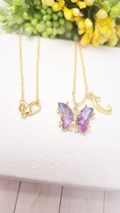 "This Cute Purple Butterfly initial charm Necklace is the perfect gift for someone special! Product Details: Material: Gold 925 plated necklace Chain Length: 18 Inches (Can be made in different lengths) Charms: Butterfly charm and Initial Charm (Initial Charm can be personalized) This Initial charm necklace can be personalized according to your choice. Please reach out to me for customizations. You can get these personalized necklaces in any length, so please contact me via Etsy Conversations if you need any size. This exquisite 18\" snake chain necklace comes with a horse, boot charm and a silver letter initial charm that can be customized according to your choice. This minimalist and dainty necklace is made with a high-quality silver material that is eco-friendly, durable, and anti-infla Dainty Charm Necklace For Birthday, Birthday Pendant Necklace With Charms, Pink Charm Necklace For Gifts, Personalized Pink Charm Necklace As Gift, Pendant Necklaces For Birthday Gift, Pink Hypoallergenic Necklace For Mother's Day, Butterfly Charm Pendant Necklace As Gift, Butterfly Charm Pendant Necklace For Gift, Pink Butterfly Charm Necklace For Gift