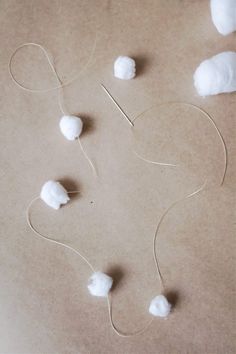 cotton floss are on the ground and ready to be strung