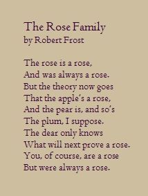 the rose family poem by robert frost, written in pink ink on brown paper with black writing