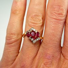 NATURAL RUBY RING Three 3 Stone Ruby Ring Ruby Diamond Ring 14K Yellow Gold 1970s Mid Century Ruby E Red Three Stone Diamond Ring For Promise, Red Three-stone Diamond Promise Ring, Red Three Stone Diamond Promise Ring, Formal Red Ruby Ring With Three Stones, Formal Ruby Three Stone Ring, Classic Red Three Stone Diamond Ring, Formal Red Three Stone Ruby Ring, Red Ruby Three Stone Round Cut Ring, Fine Jewelry Red Ruby Three Stone Ring