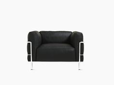 a black leather chair with chrome legs and armrests on an isolated white background