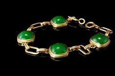 "This is a very beautiful, old and unique PEKING GLASS GILDED SILVER c. 1940 bracelet. The bracelet has a marvelous Peking glass with deep green color (11 x 11 mm) with gilded silver. It measures 7\" x 1/2\". The bracelet has a very unique and elegant feel to it and is in very good condition. 0.7 AOJFPC-806-124" Luxury Green Collectible Jewelry, Classic Jade Bracelets For Formal Occasions, Green Cabochon Bracelets For Gift, Green Cabochon Bracelets As A Gift, Elegant Green Cabochon Bracelets, Green Cabochon Bracelet For Formal Occasions, Art Deco Jade Jewelry For Formal Occasions, Green Bangle For Collectible Jewelry, Green Cabochon Bracelets For Formal Occasions