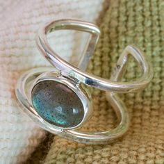 Ancient civilizations believed that labradorite stones protected them from negative energies, using this stunning jewel as an amulet of good fortune. Today, this precious stone inspires Mexican artisan Ezequiel Tapia to craft a sterling silver wrap ring featuring said gem as the centerpiece, all polished for an exquisite vibe. Silver Wrap Ring, Wrap Ring, Citrine Ring, Sterling Silver Necklace Pendants, Labradorite Stone, Wrap Rings, Ancient Civilizations, Fun Earrings, Jewelry Packaging