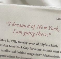 a close up of a piece of paper with writing on it that says, i dream of new york, i am going there