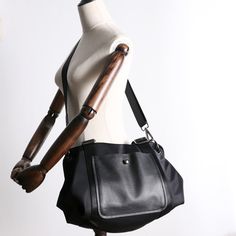 Overview： Design: Black Nylon Shoulder Bag Handbag Women's Nylon Crossbody Bag Black Crossbody Nylon Bag In Stock: Ready to Ship (2-4 days)Include: Only BagCustom: NoColor: BlackLeather: Nylon, LeatherMeasures: 37 cm x 30cm x 20cm Weight: 0.65kgSlots: 2 main slots, 2 zipper slot, 1 phone pocket, 1 wallet pocket, 2 side slotsAccessories(option): NoneStyle: Black Nylon Shoulder Bag Handbag Women's Nylon Crossbody Bag Black Crossbody Nylon Bag Very durable (At least 5 Years) and it should last a li Nylon Tote Shoulder Bag For Commuting, Nylon Commuting Shoulder Tote Bag, Black Nylon Satchel Shoulder Bag, Black Nylon Shoulder Bag With Zipper Pocket, Black Nylon Shoulder Bag With Adjustable Strap, Black Nylon Crossbody Shoulder Bag, Black Nylon Bags With Anti-theft Pocket, On-the-go Nylon Shoulder Bag With Anti-theft Pocket, Black Nylon Shoulder Bag With Removable Pouch