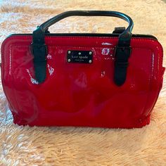 Gorgeous Kate Spade Patent Leather Red Tote Bag. Euc 1 Mark On Back Of Purse , White Mark Very Small Picture Taken She Is Beautiful. Comes With Dust Bag Pictured Not Sold Anymore Everyday Red Kate Spade Shoulder Bag, Red Kate Spade Bag For Shopping, Kate Spade Red Bag, Elegant Red Kate Spade Shoulder Bag, Kate Spade Red Rectangular Shoulder Bag, Red Tote Bag, Red Tote, White Mark, Small Pictures