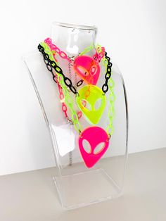 "Beam Me Up Alien Choker -charm designed and created in house -Nomad Kandi staple piece -uv reactive/blacklight reactive -charm is approximately 1.75\" x 1.25\" -select black, lime green or hot pink chain -matching earrings available -wear it to a music festival, local show or add a pop of color to your every day look! -adjustable up to 16\"" Space Theme Costume, Alien Kandi, Kandi Choker, Alien Earrings, Glow Necklace, Music Festival Accessories, Alien Necklace, Kandi Necklace, Neon Rave