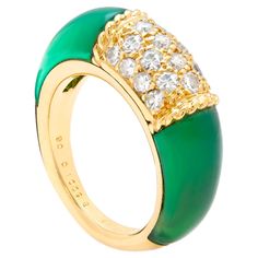 18ct gold Very Rare Van Cleef & Arpels PHILIPPINES ring Set with 2 polished green Chrysoprase hard stones either side of a Diamond Pave centre. Van Cleef & Arpeks arguably the Master of all French Maisons presents this absolute classic style, and beautiful example for a VCA collector. Signed: VCA Makers mark 750 (18ct) Elegant Green Enamel Ring With Polished Finish, Formal Oval Green Enamel Ring, Formal Green Enamel Ring With Polished Finish, Formal Green Oval Enamel Ring, Green Oval Enamel Ring For Formal Occasions, Elegant Green Enamel Gemstone Ring, Hallmarked Green Enamel Ring For Anniversary, Green Hallmarked Enamel Ring For Anniversary, Green Oval Enamel Ring For Anniversary